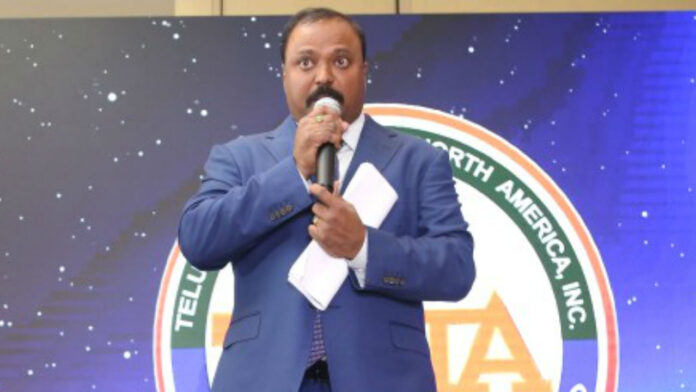 satish-vemana-on-stage-in-tana-22nd-conference